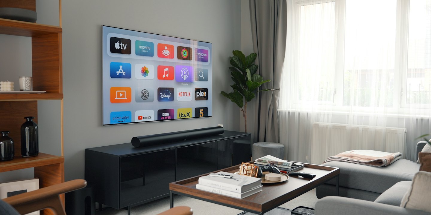 Modern living room with a smart TV above a media console.